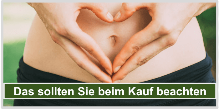 Eine Frau, die mit ihren Händen ein Herz über dem Bauch formt Inulin Kauf Bild